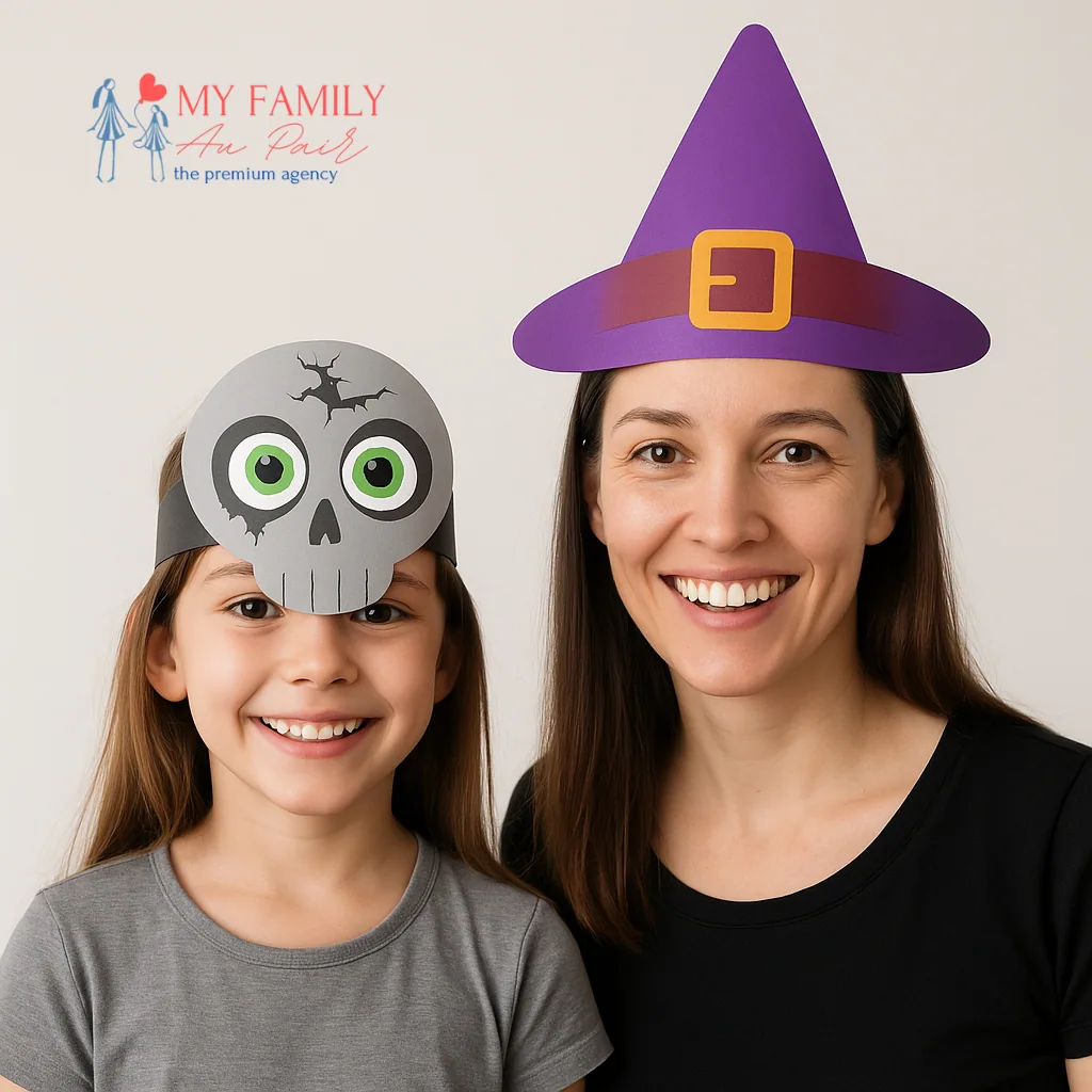Happy mom and child with their Halloween hat